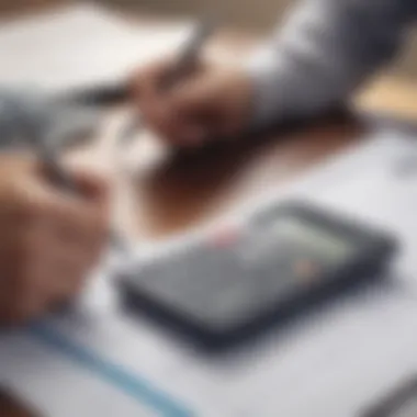 A person reviewing financial paperwork with a calculator.