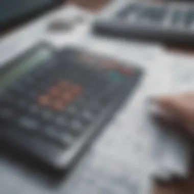 A calculator with financial documents representing cost analysis